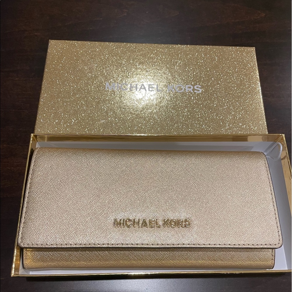 Michael Kors Gold Wallet. Brand new… very pretty full size wallet.